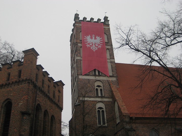 kolegiata w środzie flaga - Rafał Regulski